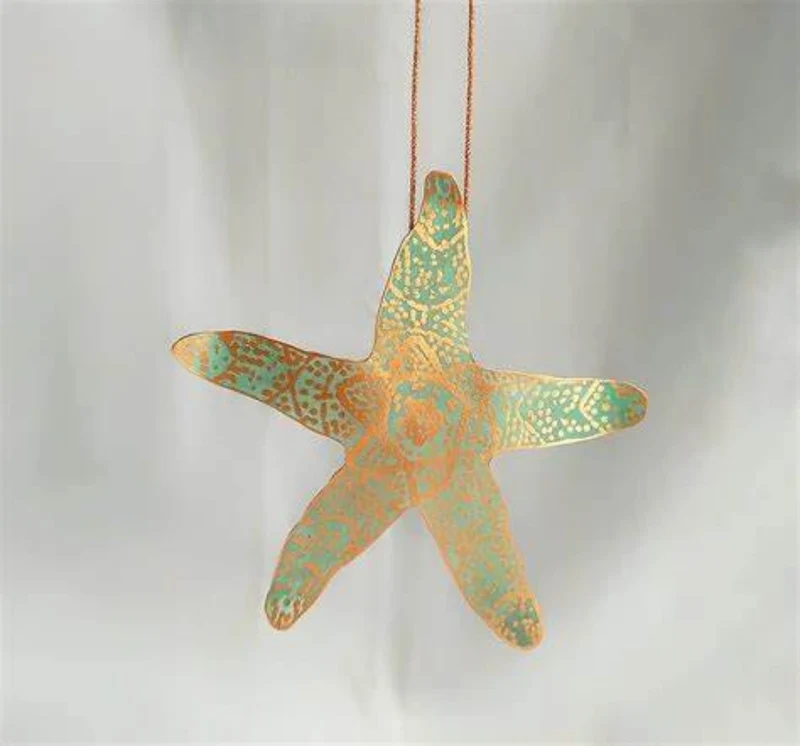 COLGANTE ESTRELLA DE MAR DE SINGULAR SISTERS