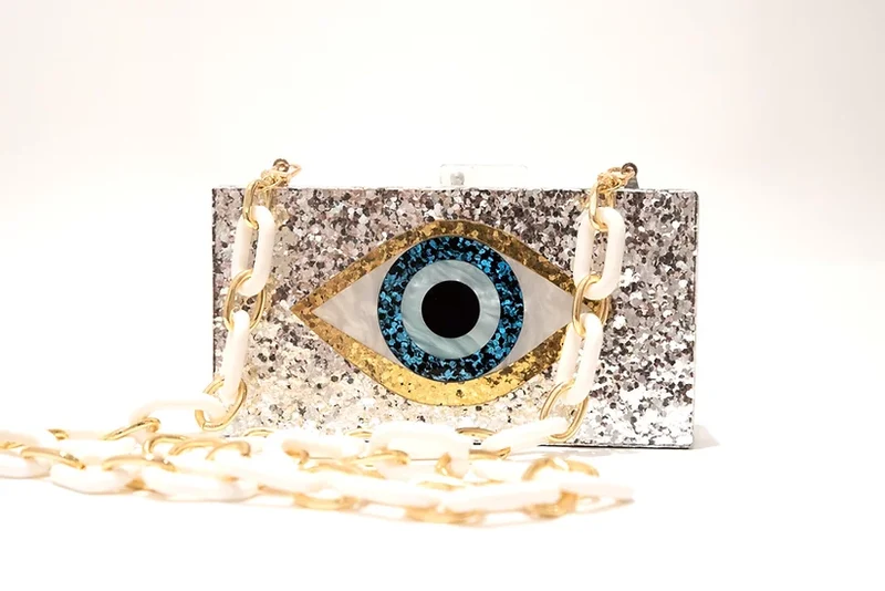 BOLSO OJO PLATA